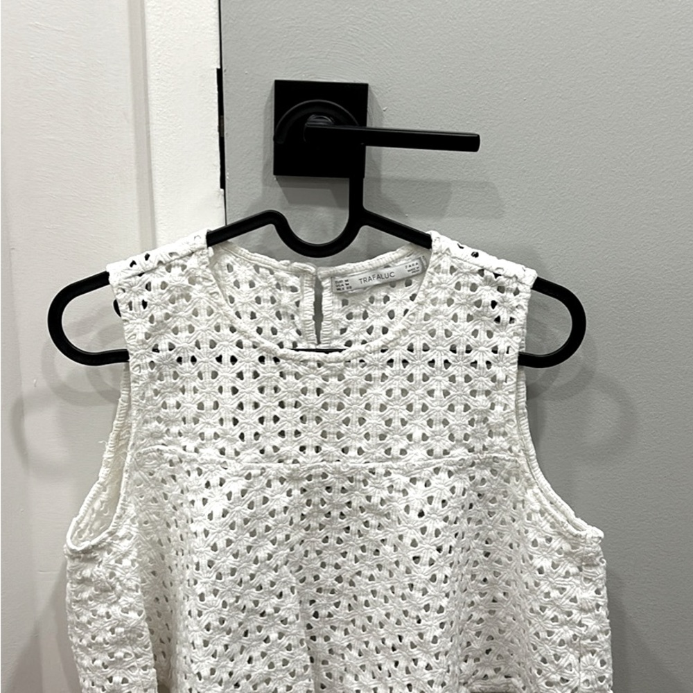 Sleeveless white top